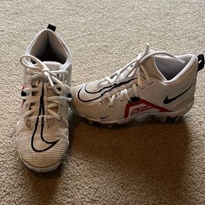 Size 2 Nike Alpha white lacrosse/baseball/football cleats in good condition
